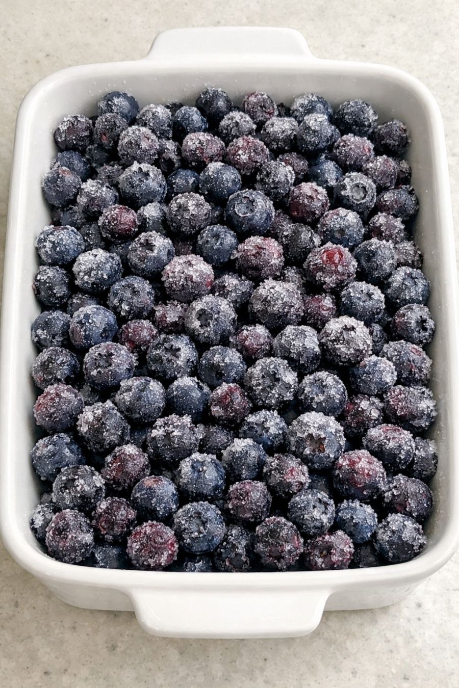 Dump frozen raw blueberries straight into the casserole dish with 3 simple ingredients and watch your husband go back for thirds of this unbelievable