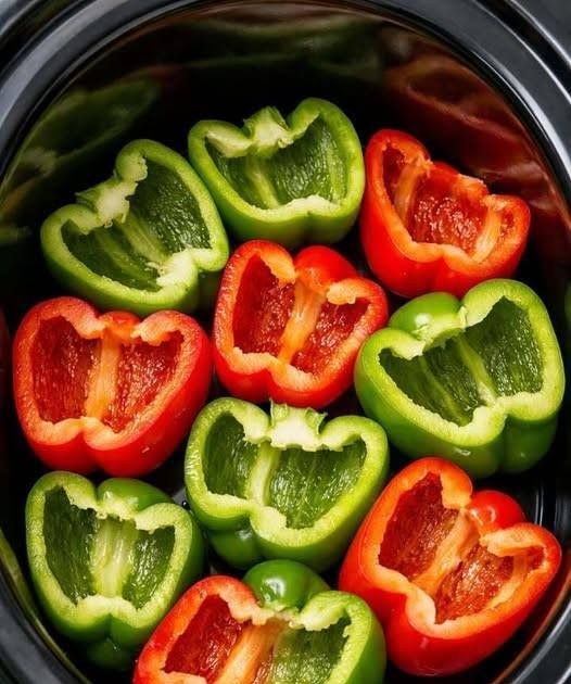 Place raw halved bell peppers in the slow cooker along with four simple ingredients, and you’ll end up with a meal so flavorful your family will be asking for seconds.